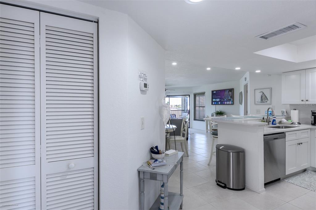 2601 West Marion Avenue, Unit 41C Punta Gorda, FL 33950 - Photo 6 of 43 a kitchen with furniture and a window