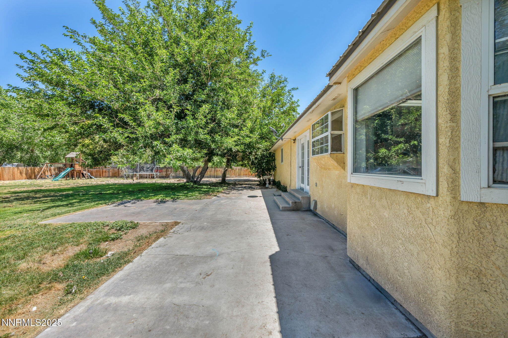 4210 Magnolia Road Fallon, NV 89406 - Photo 54 of 66 a view of a house with a yard