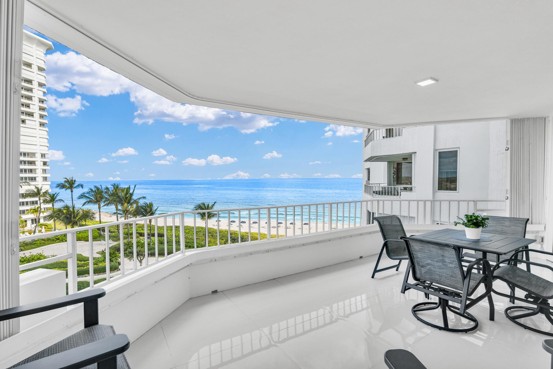 550 South Ocean Boulevard, Unit 605 Boca Raton, FL 33432 - Photo 13 of 51 a view of a balcony with chairs