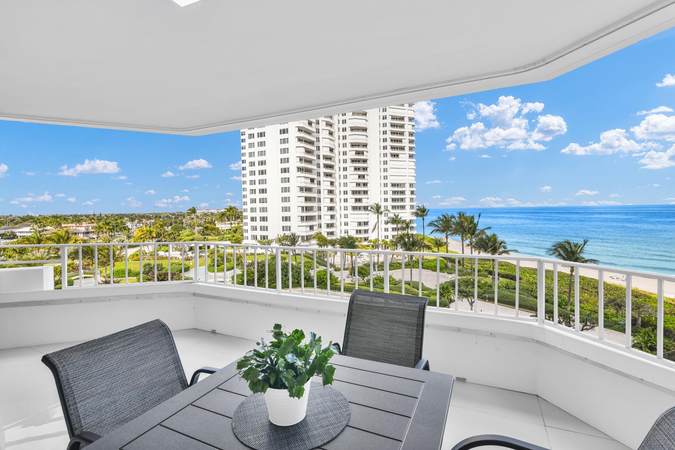 550 South Ocean Boulevard, Unit 605 Boca Raton, FL 33432 - Photo 15 of 51 a view of a balcony with lake view and a potted plant