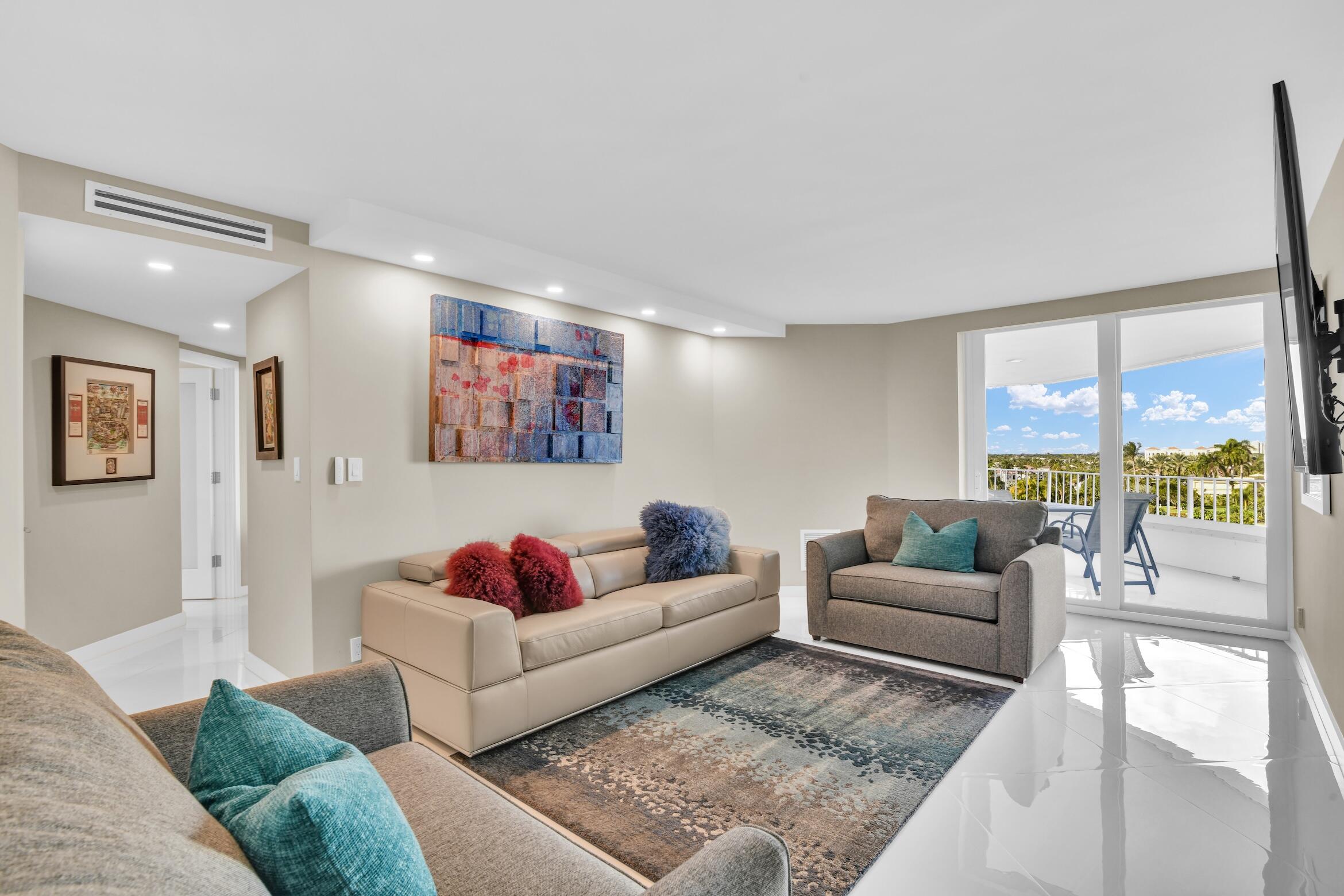 550 South Ocean Boulevard, Unit 605 Boca Raton, FL 33432 - Photo 25 of 51 a living room with furniture and a large window