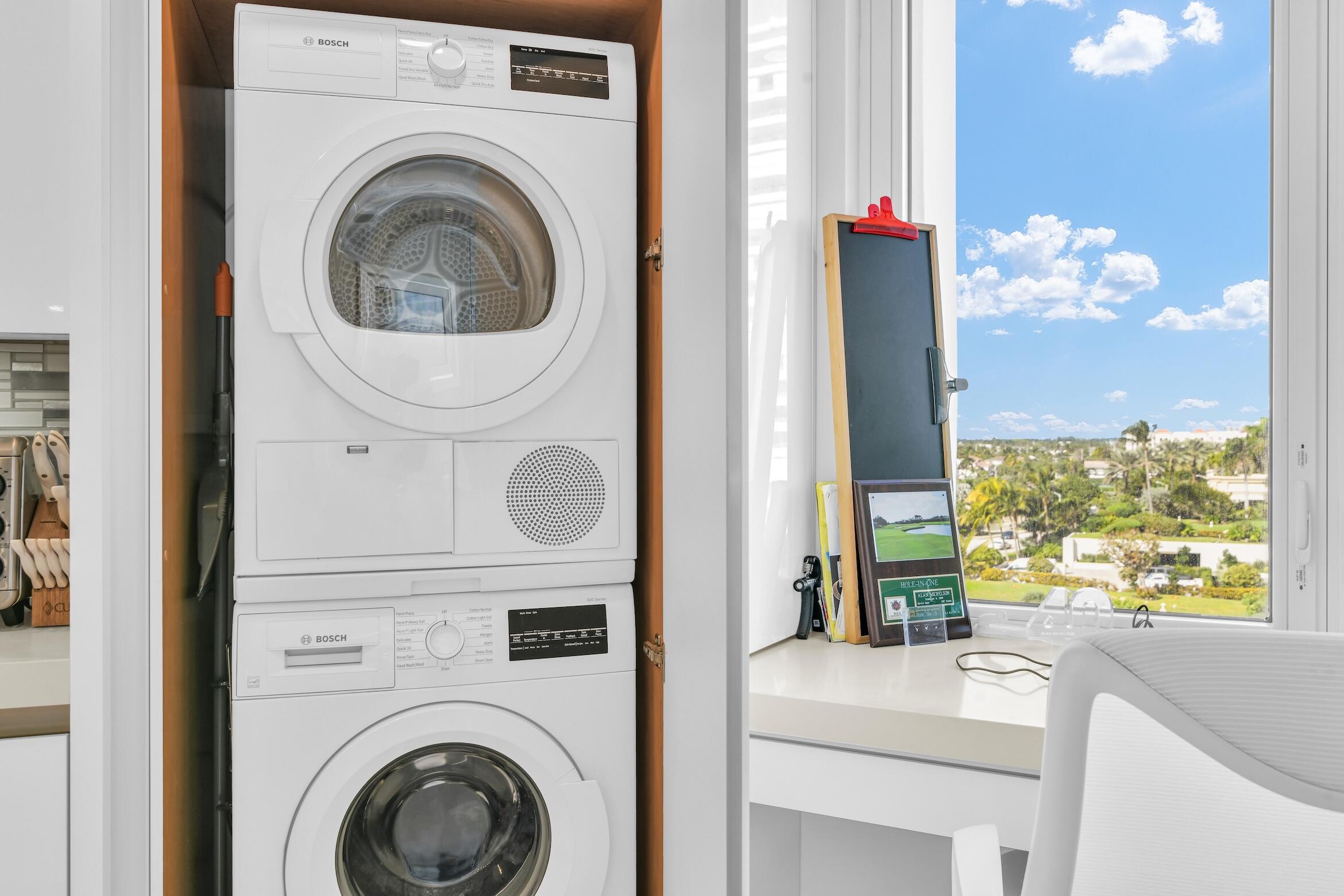 550 South Ocean Boulevard, Unit 605 Boca Raton, FL 33432 - Photo 28 of 51 a room with window washer and dryer