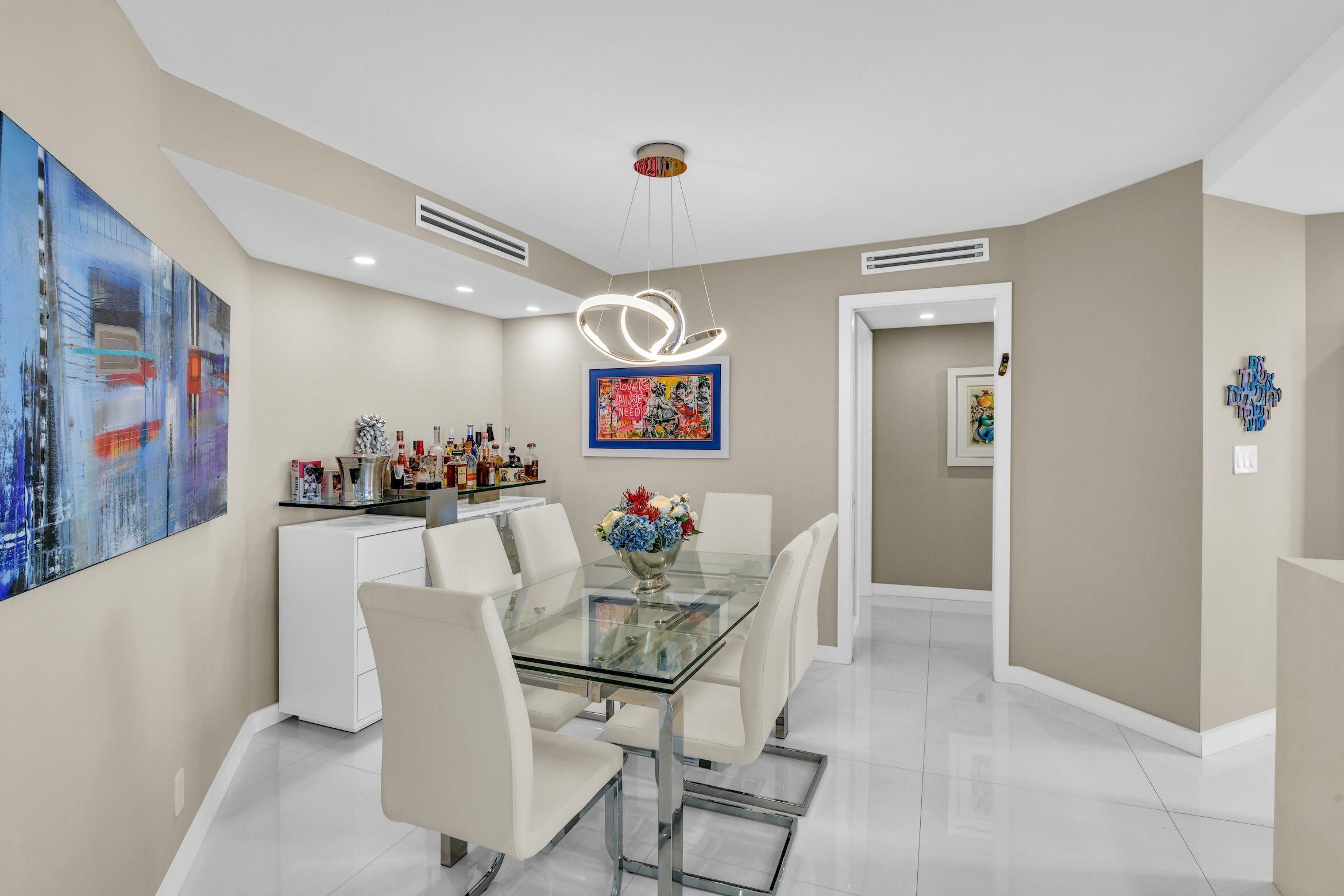 550 South Ocean Boulevard, Unit 605 Boca Raton, FL 33432 - Photo 7 of 51 a view of a dining room with furniture