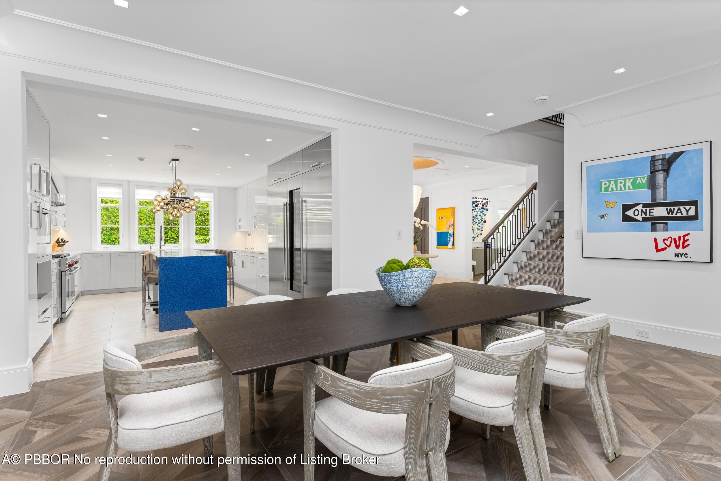 201 Banyan Road Palm Beach, FL 33480 - Photo 13 of 42 a view of a dining room with furniture and a potted plant