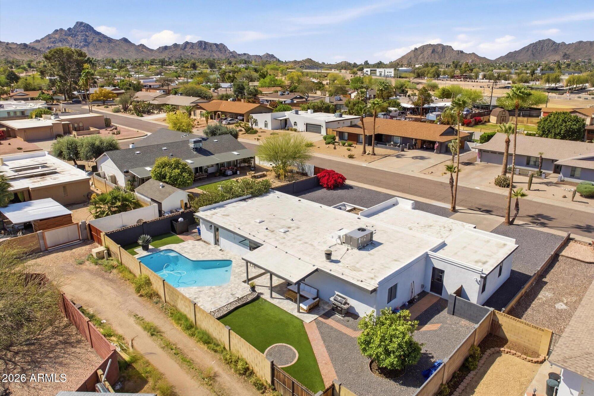 10245 North 34th Place Phoenix, AZ 85028 - Photo 26 of 26 an aerial view of residential houses with outdoor space