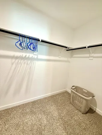 a view of a room with racks on the wall