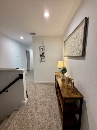 a view of a workspace with furniture