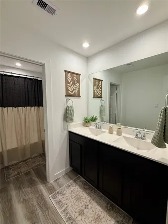 a bedroom with a bed and a table