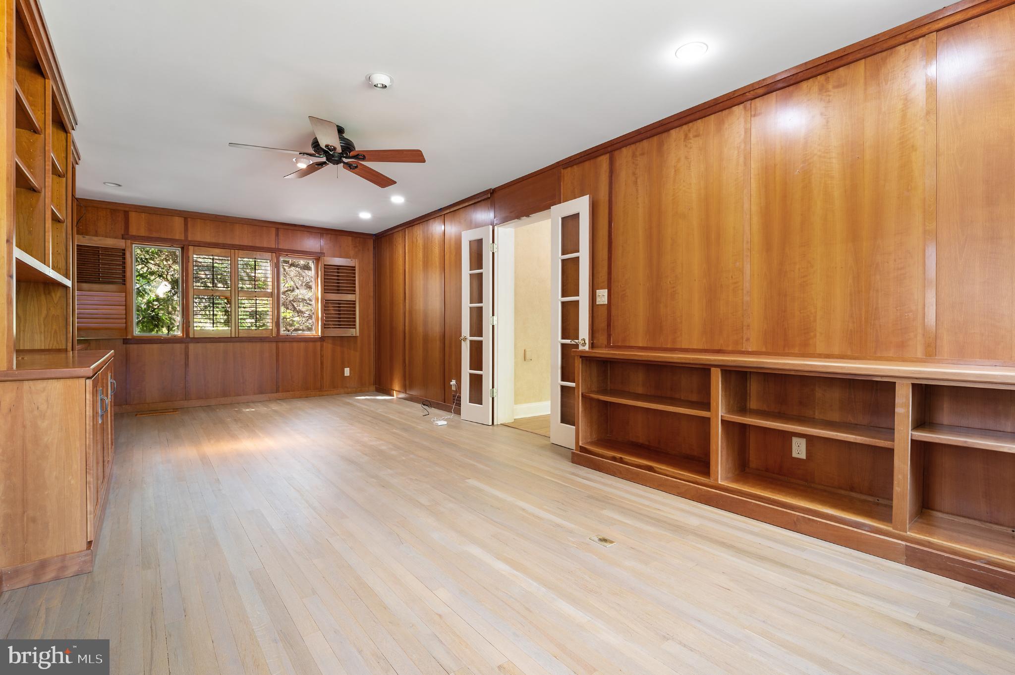 15729 Holly Grove Road Silver Spring, MD 20905 - Photo 23 of 83 Large office or library. Warm wood accents.