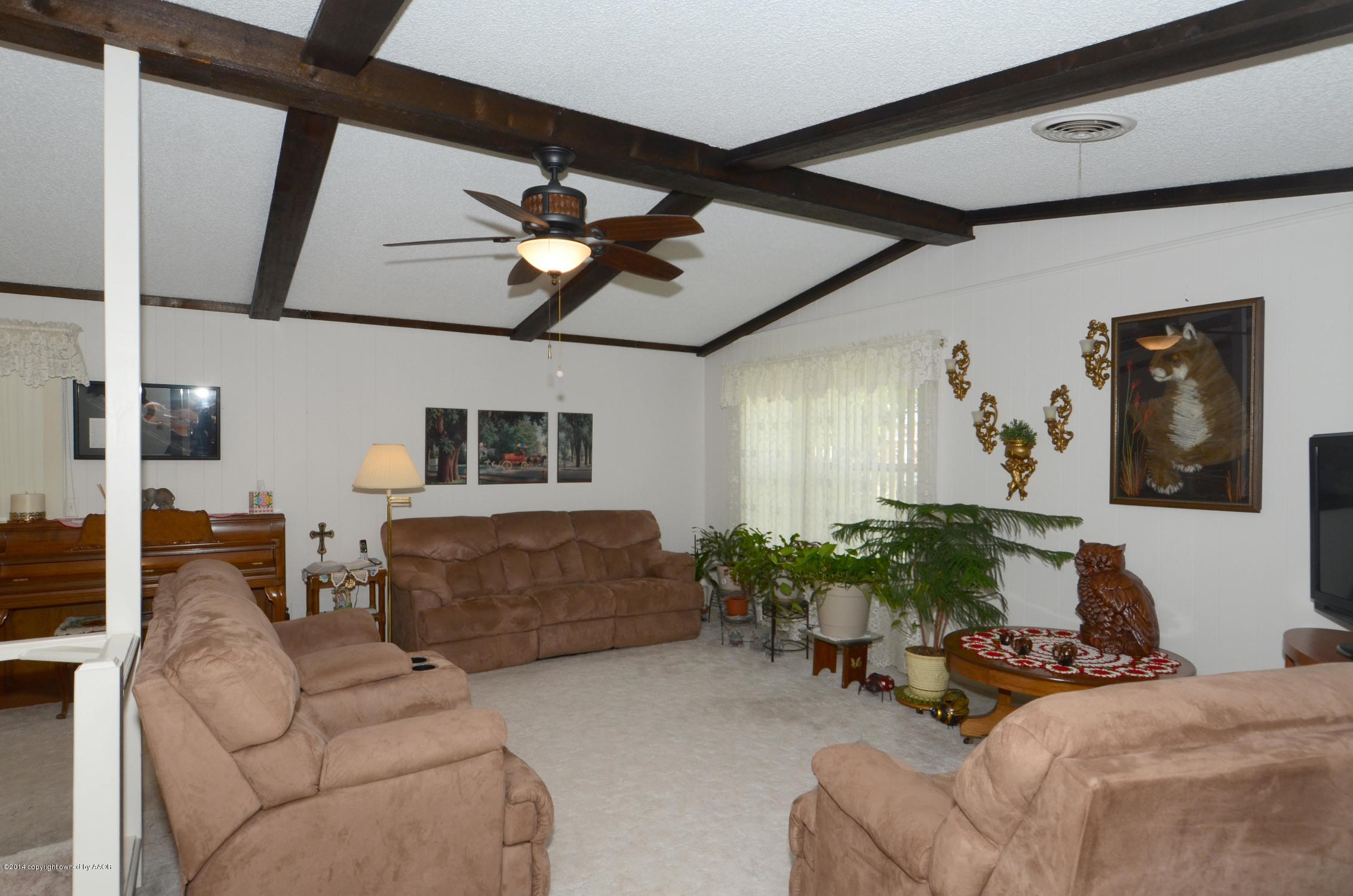 6507 Garwood Road Amarillo, TX 79109 - Photo 6 of 20 a living room with furniture and wooden floor