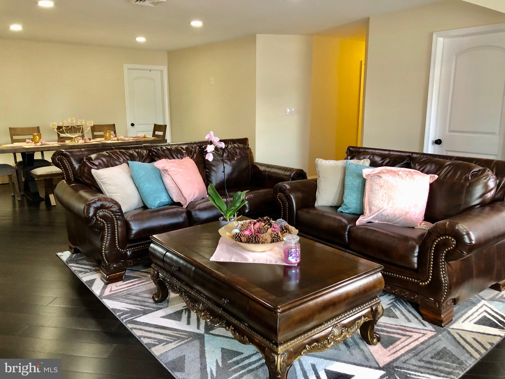 53 Goodturn Road Levittown, PA 19057 - Photo 3 of 42 a living room with furniture and wooden floor