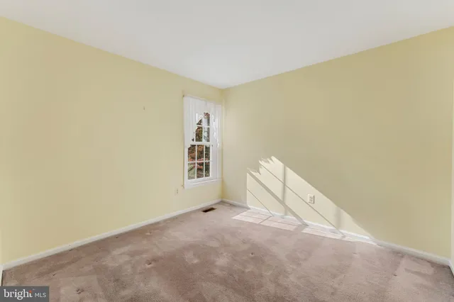 a view of a room with windows