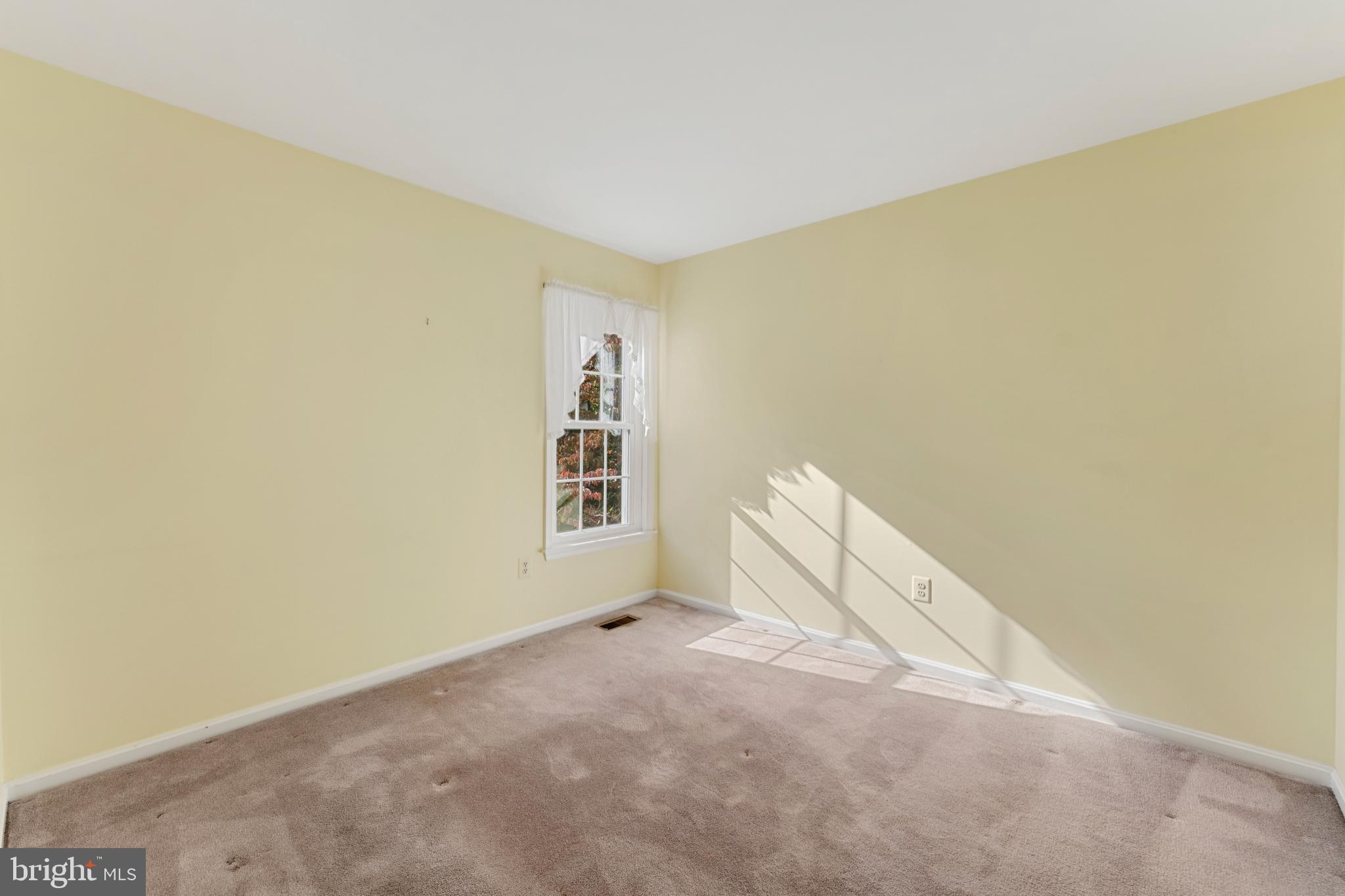 9304 Bellbeck Road Baltimore, MD 21234 - Photo 17 of 37 a view of a room with windows