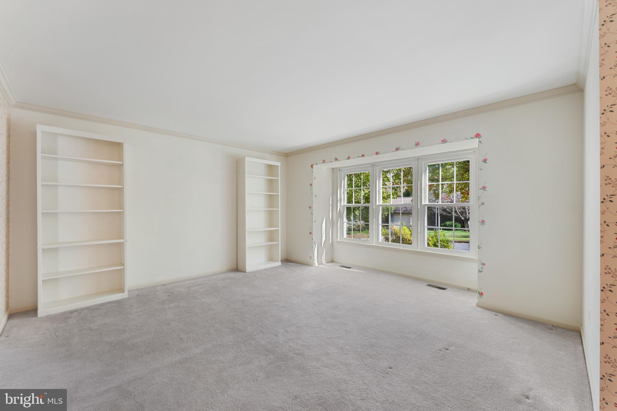 9304 Bellbeck Road Baltimore, MD 21234 - Photo 6 of 37 a view of an empty room with a window
