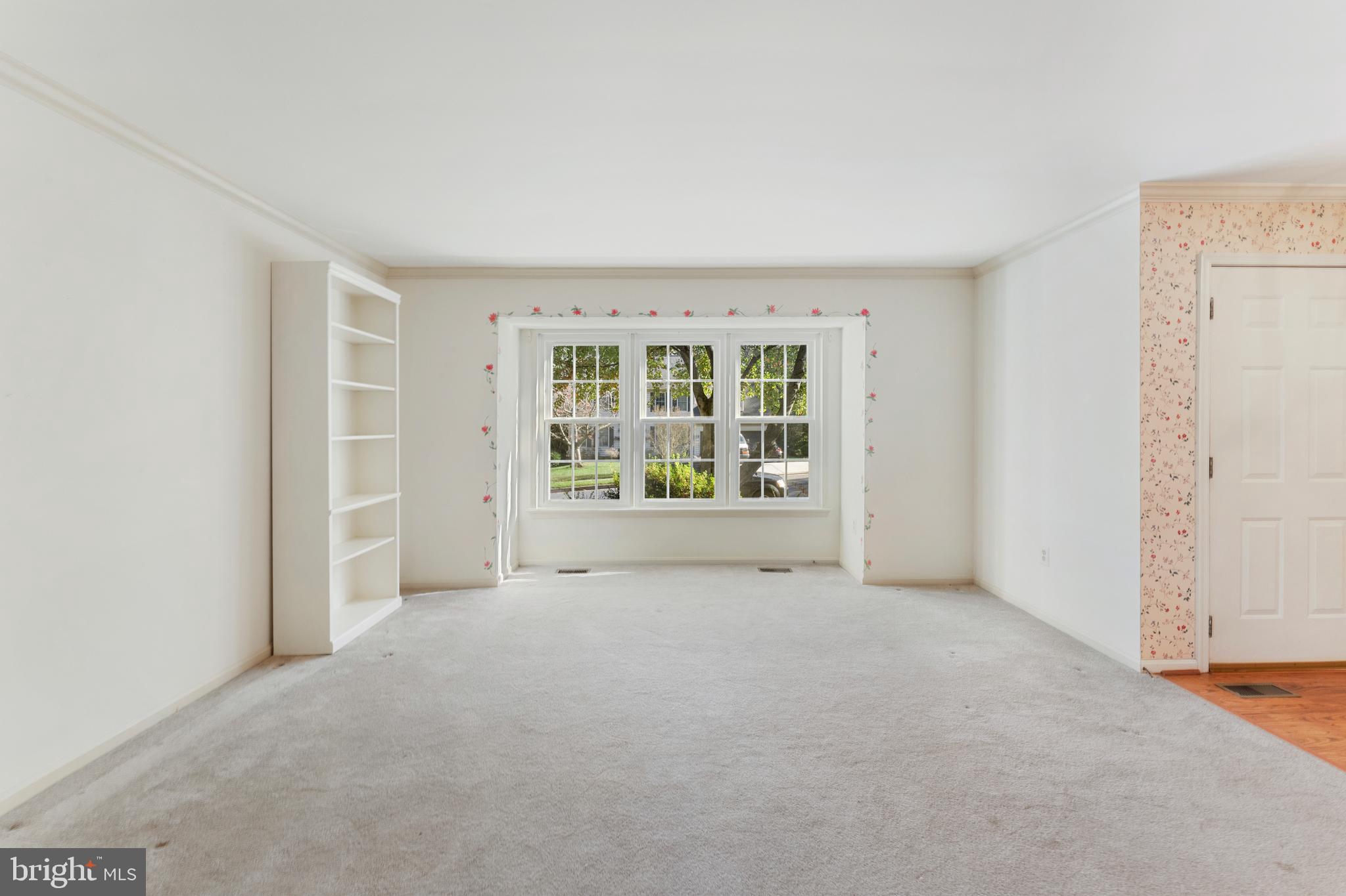 9304 Bellbeck Road Baltimore, MD 21234 - Photo 7 of 37 an empty room with windows