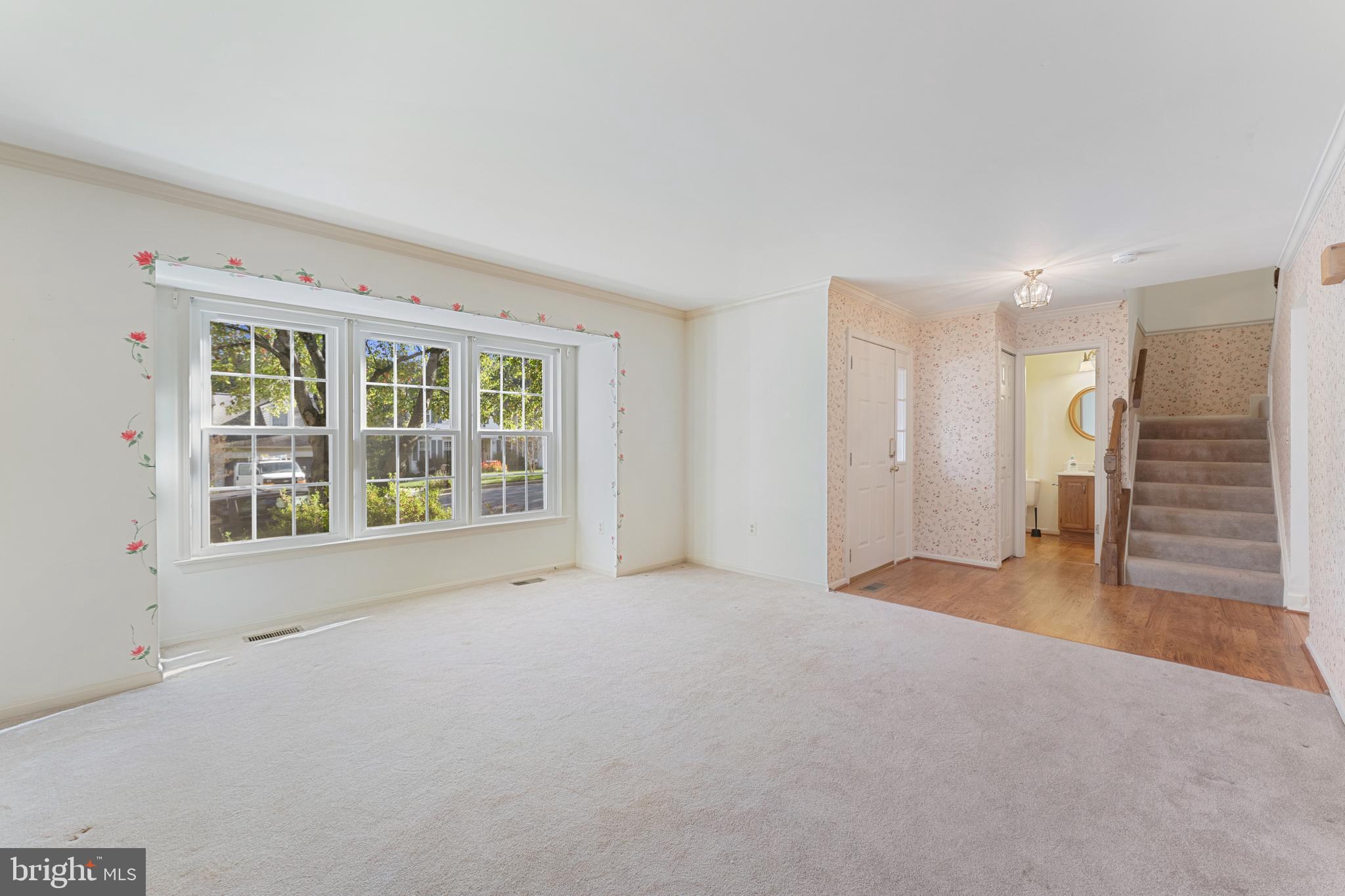 9304 Bellbeck Road Baltimore, MD 21234 - Photo 8 of 37 a view of an empty room with a window