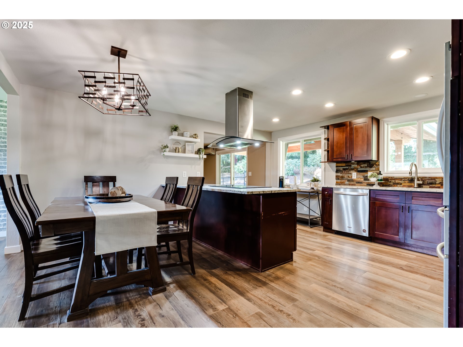 24531 Vaughn Road Veneta, OR 97487 - Photo 11 of 47 a kitchen with a table and chairs in it