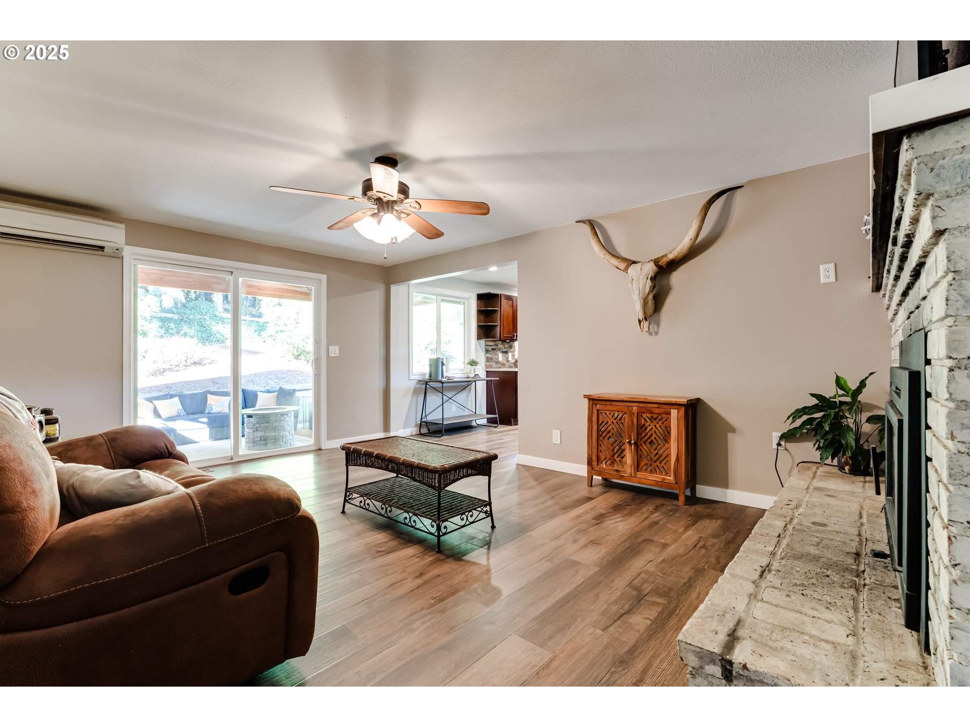 24531 Vaughn Road Veneta, OR 97487 - Photo 16 of 47 a living room with furniture and wooden floor