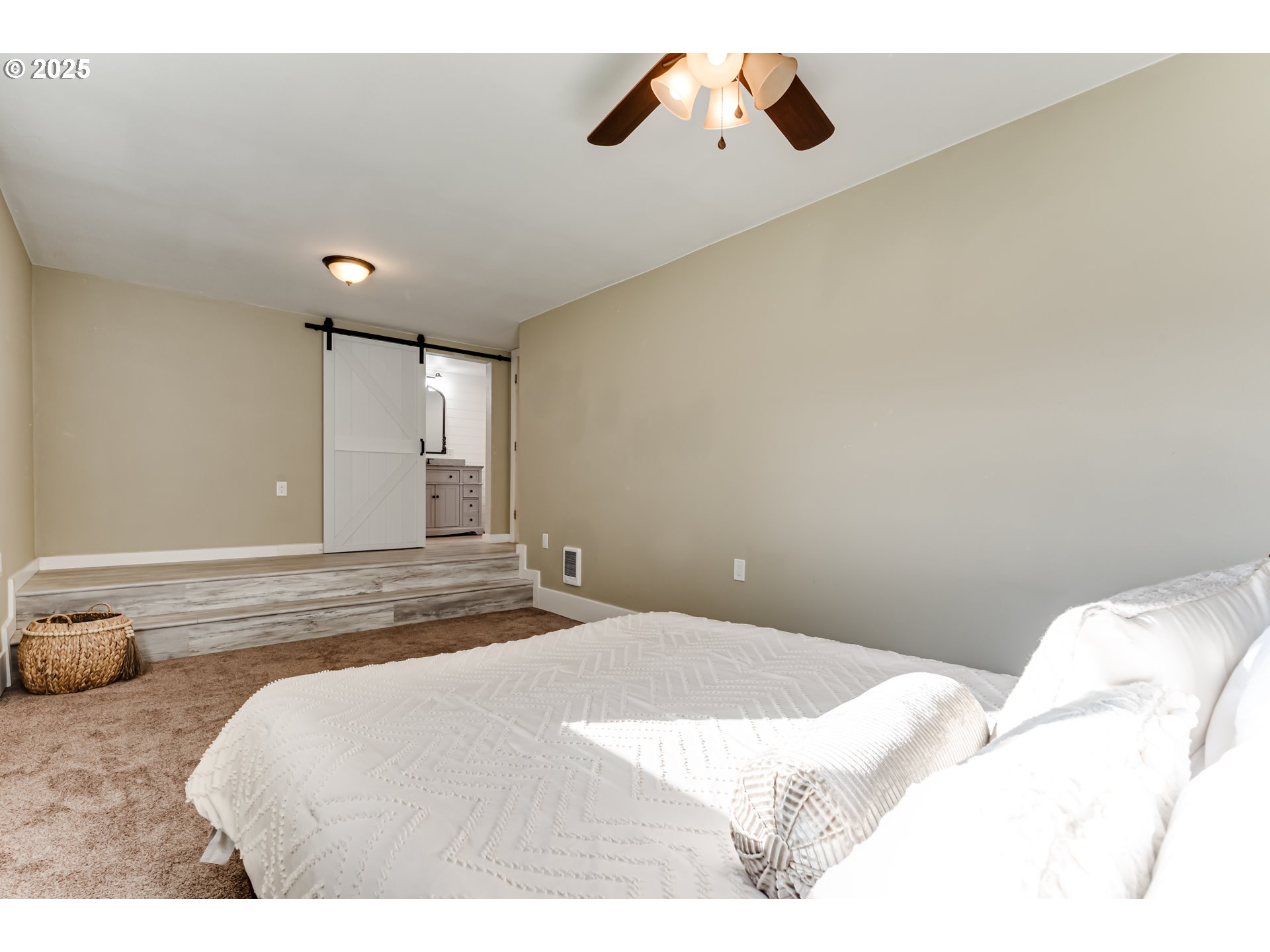 24531 Vaughn Road Veneta, OR 97487 - Photo 24 of 47 a bedroom with a bed and cabinets