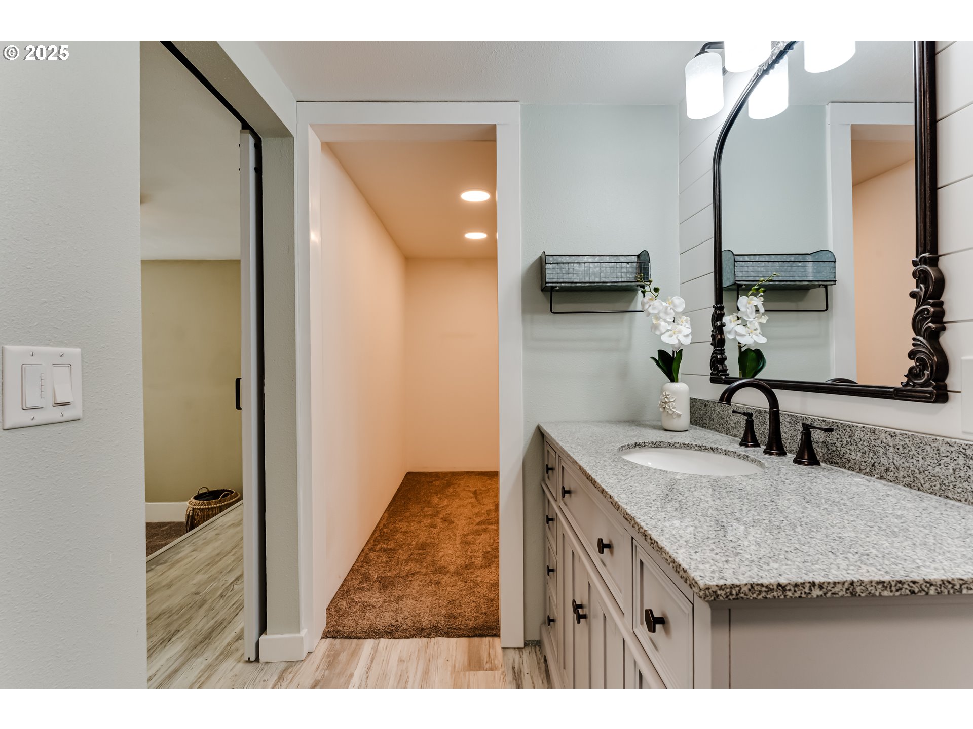 24531 Vaughn Road Veneta, OR 97487 - Photo 26 of 47 a bathroom with a granite countertop sink and a mirror