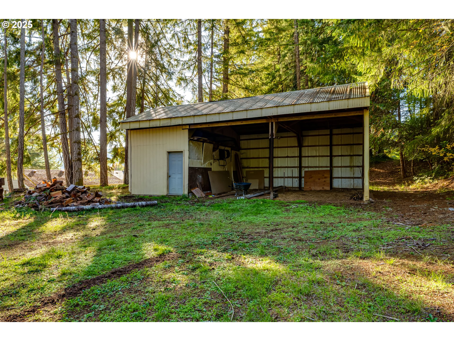 24531 Vaughn Road Veneta, OR 97487 - Photo 42 of 47 a view of a backyard with a garden and plants