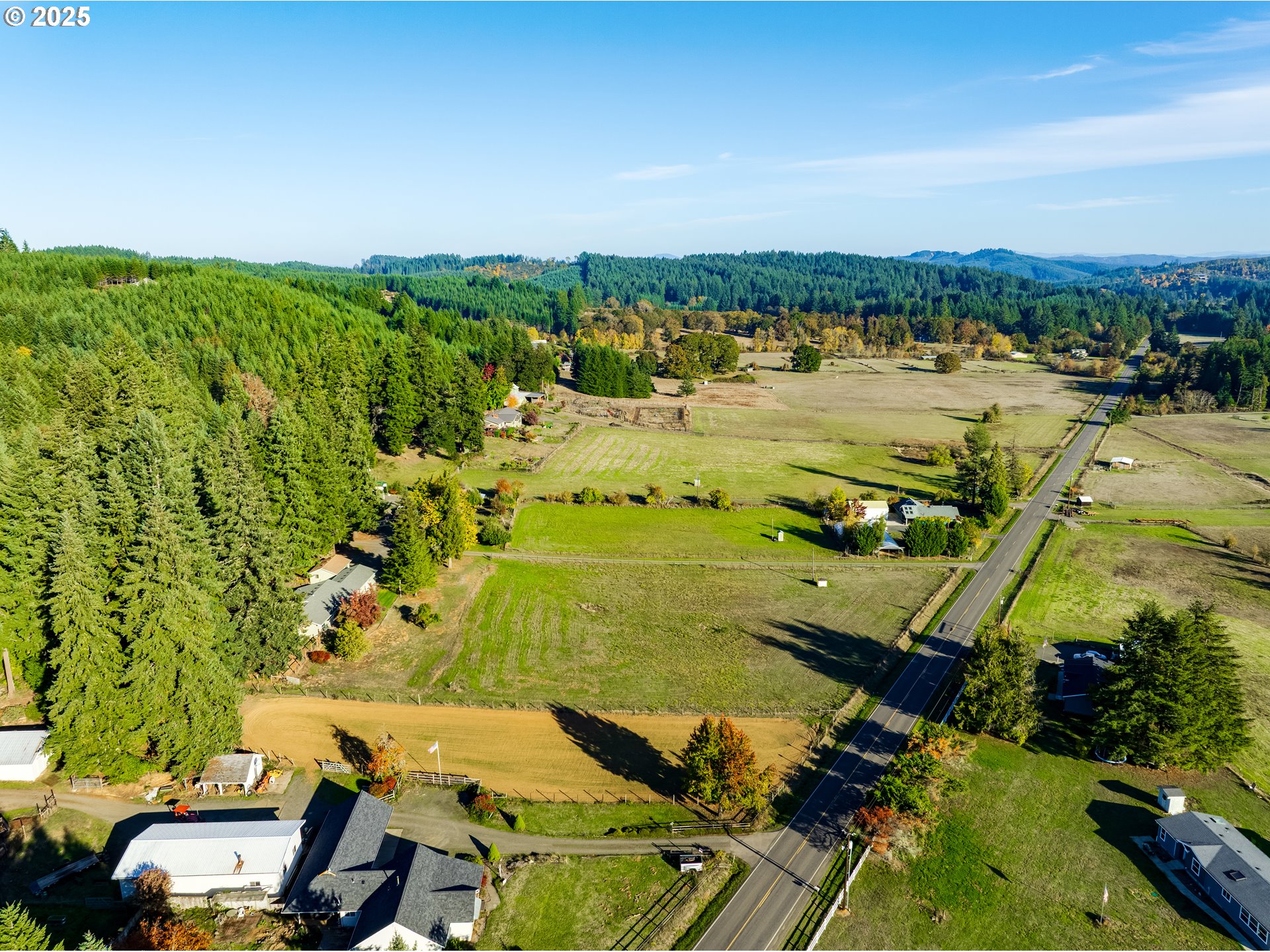 24531 Vaughn Road Veneta, OR 97487 - Photo 45 of 47 an aerial view of a residential houses with outdoor space and trees