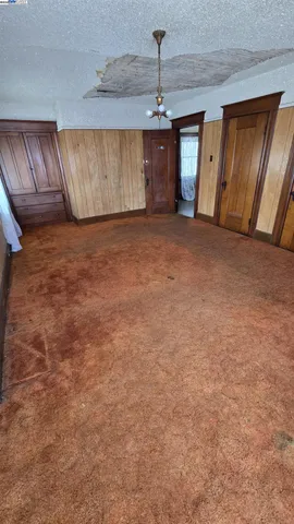 a view of a livingroom with a staircase