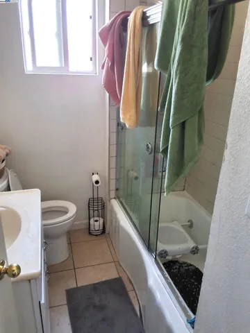 a bathroom with a sink and toilet