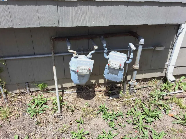 a view of a kitchen with a sink and cabinets