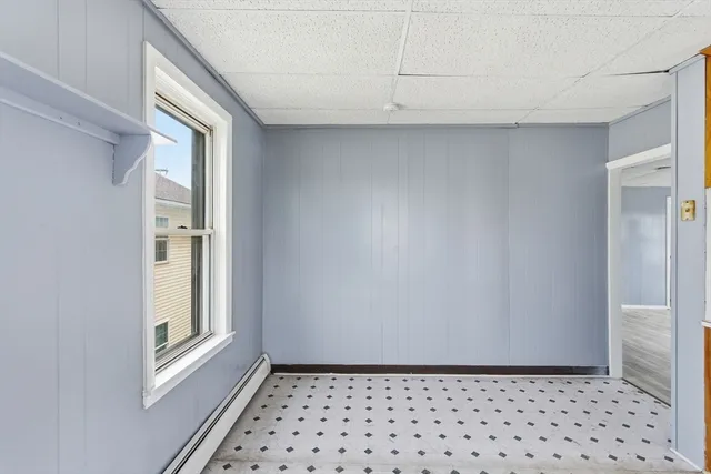 a view of a closet area with window