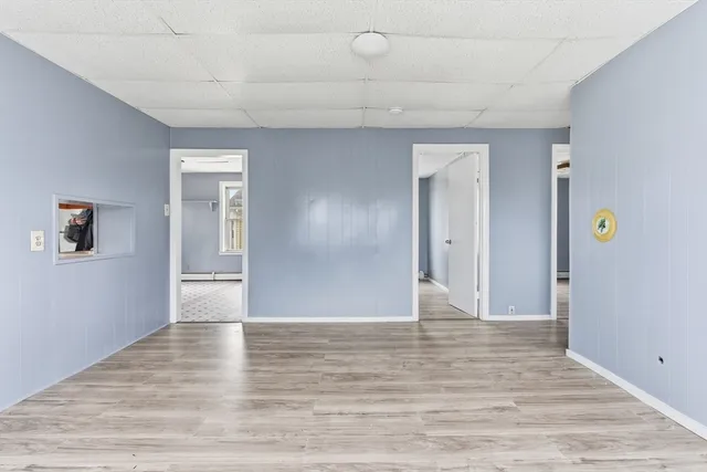 a view of an empty room and window