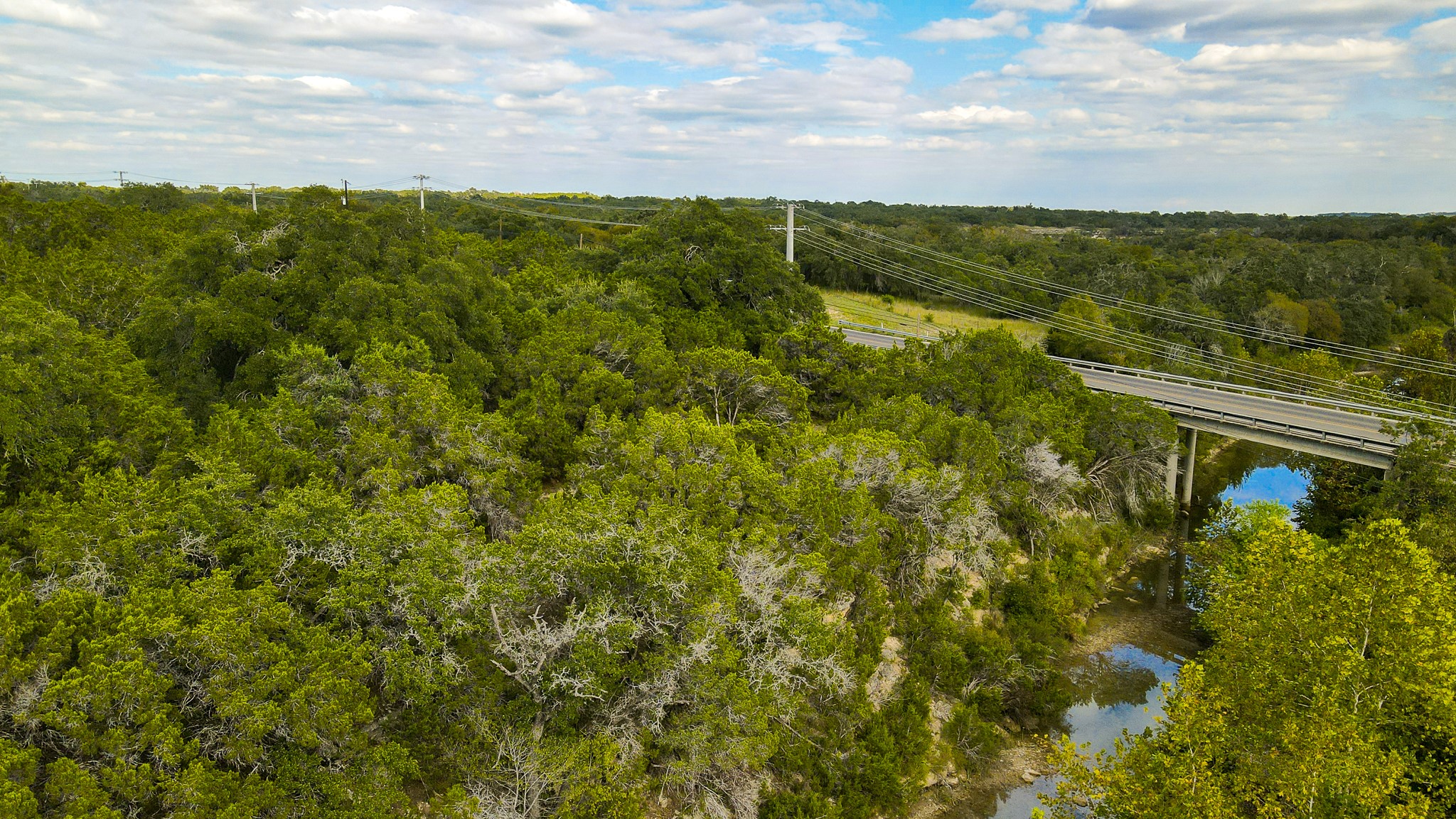 31171 Ranch Road 12 Dripping Springs, TX 78620 - Photo 12 of 21 a view of a lake from a balcony