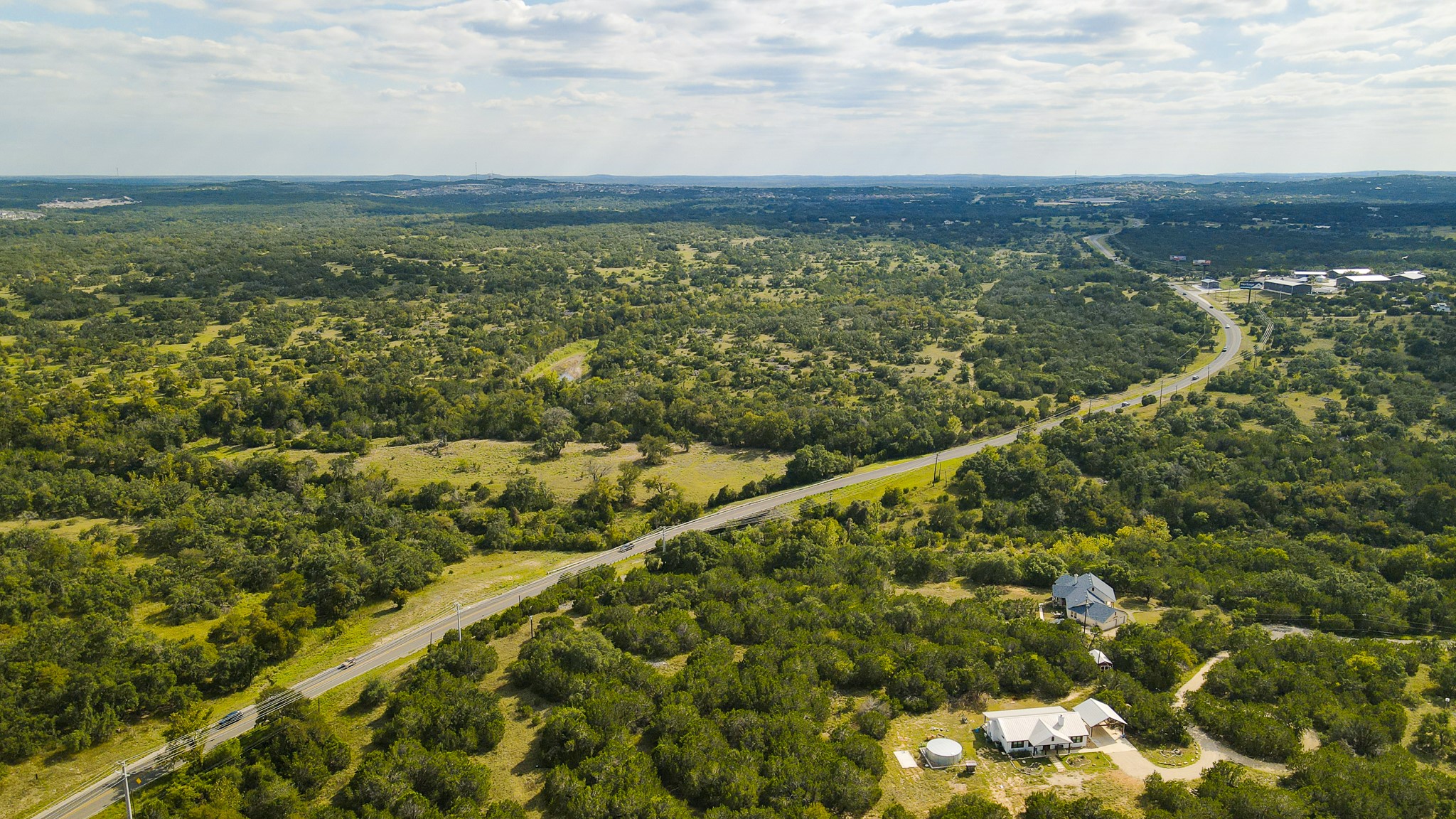 31171 Ranch Road 12 Dripping Springs, TX 78620 - Photo 2 of 21 a view of city and mountain