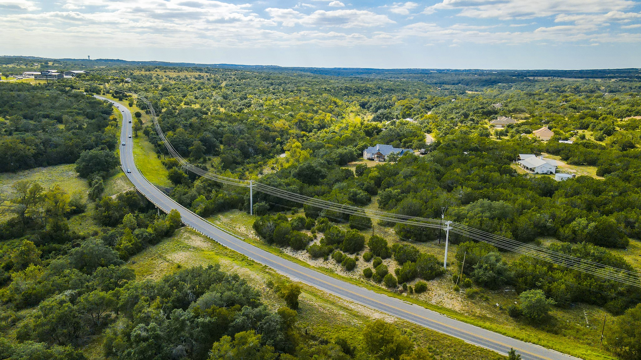 31171 Ranch Road 12 Dripping Springs, TX 78620 - Photo 4 of 21 a view of a lake from a balcony