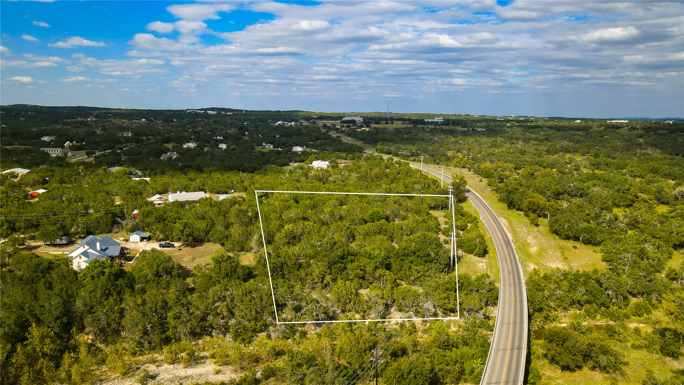 31171 Ranch Road 12 Dripping Springs, TX 78620 - Photo 7 of 21 a view of a lake
