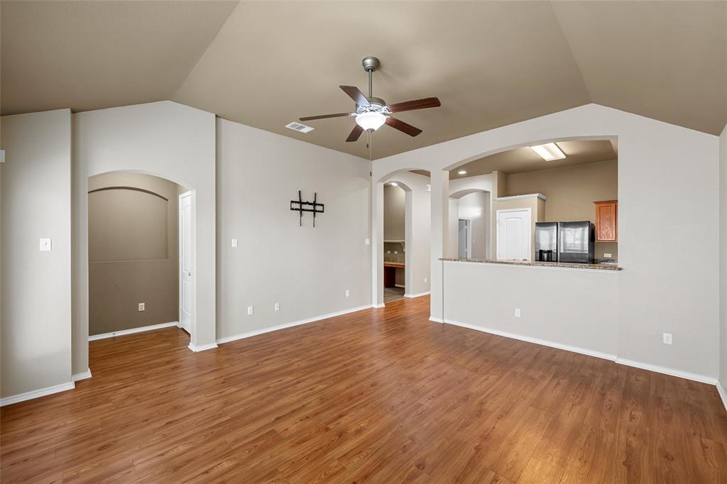 10321 Walley Way Waco, TX 76708 - Photo 7 of 19 wooden floor in an empty room with a window