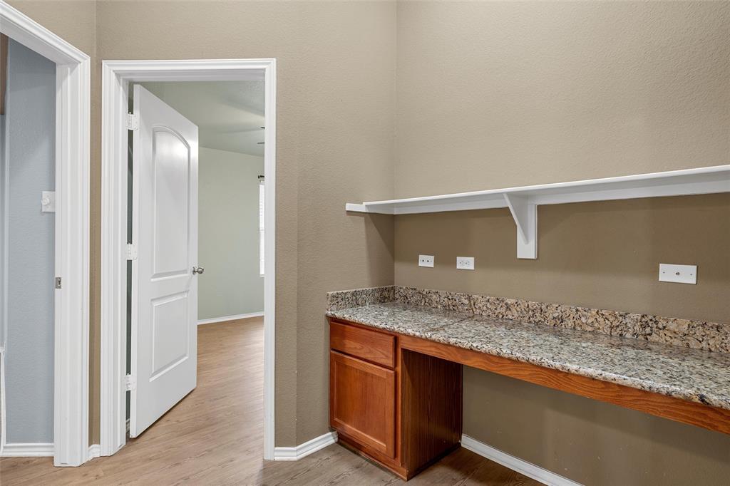 10321 Walley Way Waco, TX 76708 - Photo 9 of 19 a bathroom with a granite countertop sink and vanity