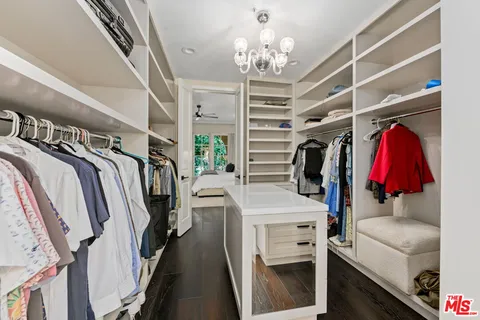a bathroom with double vanity sinks double vanity tub and a mirror