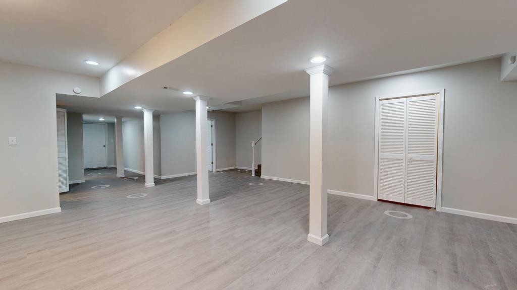 3766 Old Bridge Road Cookeville, TN 38506 - Photo 40 of 88 an empty room with wooden floor and windows