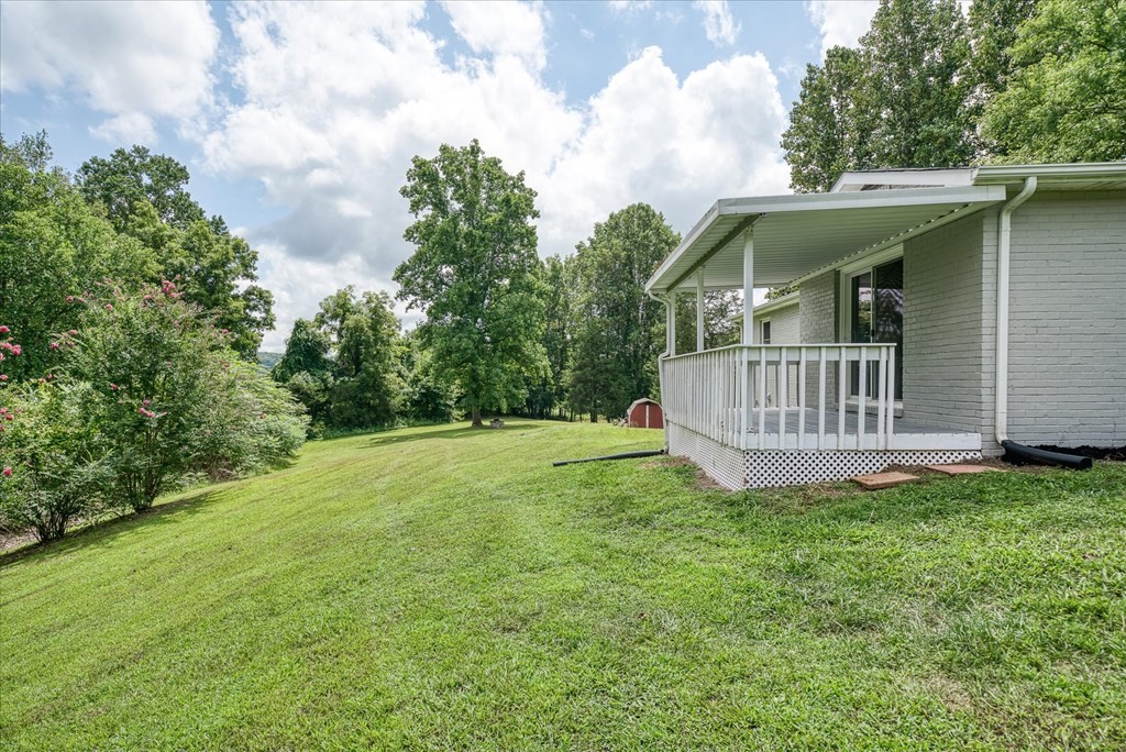 3766 Old Bridge Road Cookeville, TN 38506 - Photo 53 of 88 a view of a house with a yard and sitting area