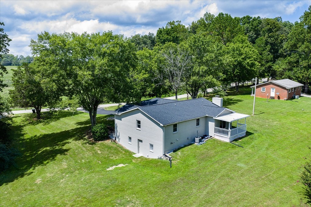 3766 Old Bridge Road Cookeville, TN 38506 - Photo 87 of 88 aerial view of a house with a big yard and large trees