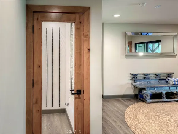 a bedroom with a bed and a table