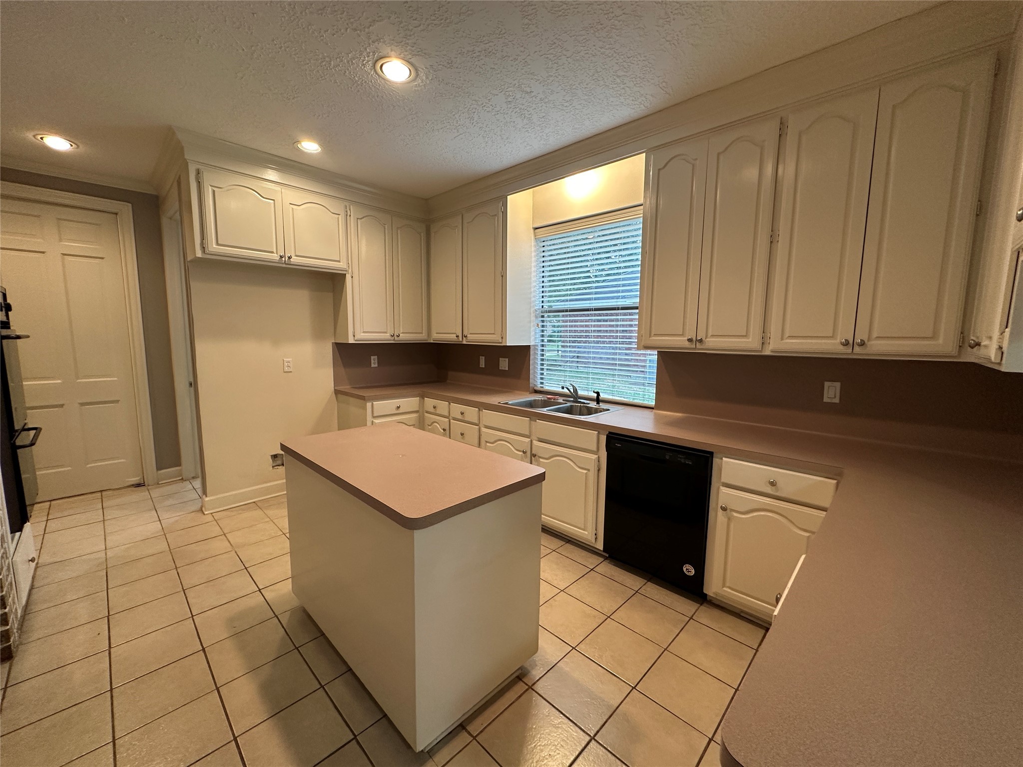 7710 Post Bridge Road Spring, TX 77389 - Photo 16 of 38 a kitchen with stainless steel appliances granite countertop a stove a sink and a microwave