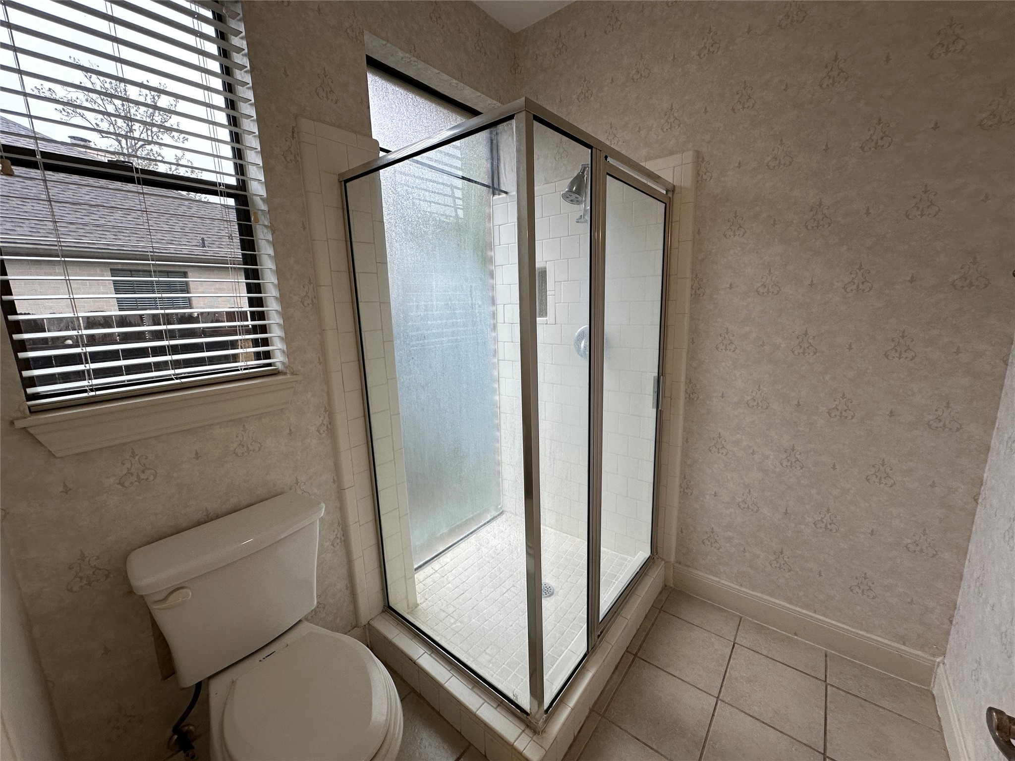 7710 Post Bridge Road Spring, TX 77389 - Photo 27 of 38 a bathroom with a toilet and a shower