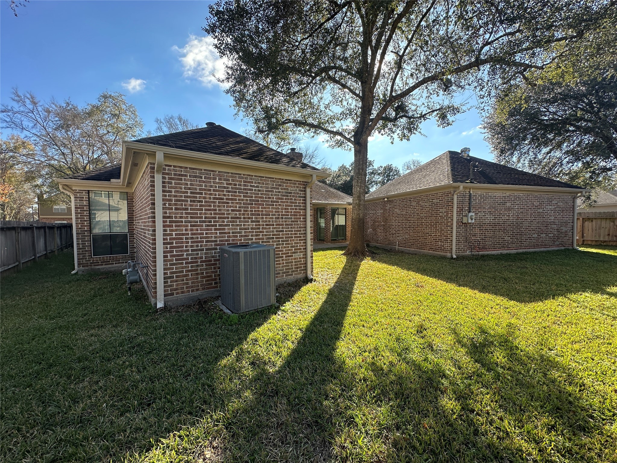 7710 Post Bridge Road Spring, TX 77389 - Photo 38 of 38 a view of backyard with large tree