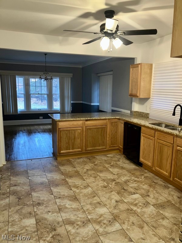 2108 Volney Road Youngstown, OH 44511 - Photo 5 of 27 Kitchen featuring dishwasher, sink, pendant lighting, ceiling fan with notable chandelier, and light tile floors