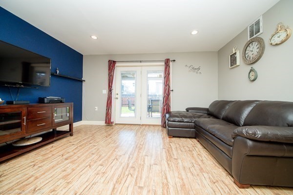 311 Ludlow Street Fall River, MA 02721 - Photo 18 of 26 a living room with furniture and a flat screen tv