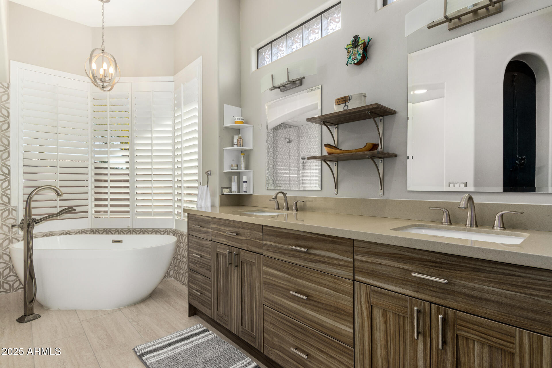 6645 East Redmont Drive, Unit 13 Mesa, AZ 85215 - Photo 15 of 41 a bathroom with a granite countertop sink mirror and bathtub