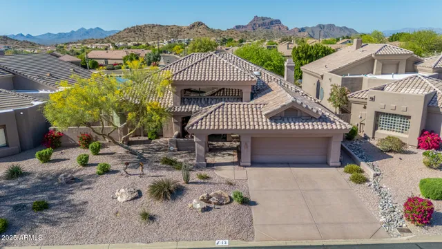 an aerial view of residential houses and outdoor space