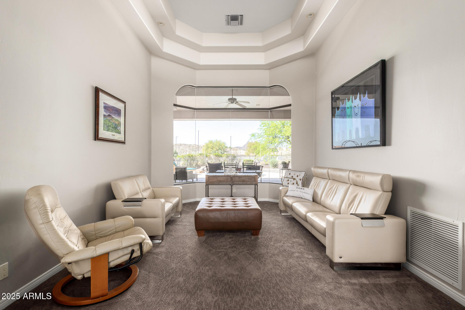 6645 East Redmont Drive, Unit 13 Mesa, AZ 85215 - Photo 6 of 41 a living room with furniture and a large window